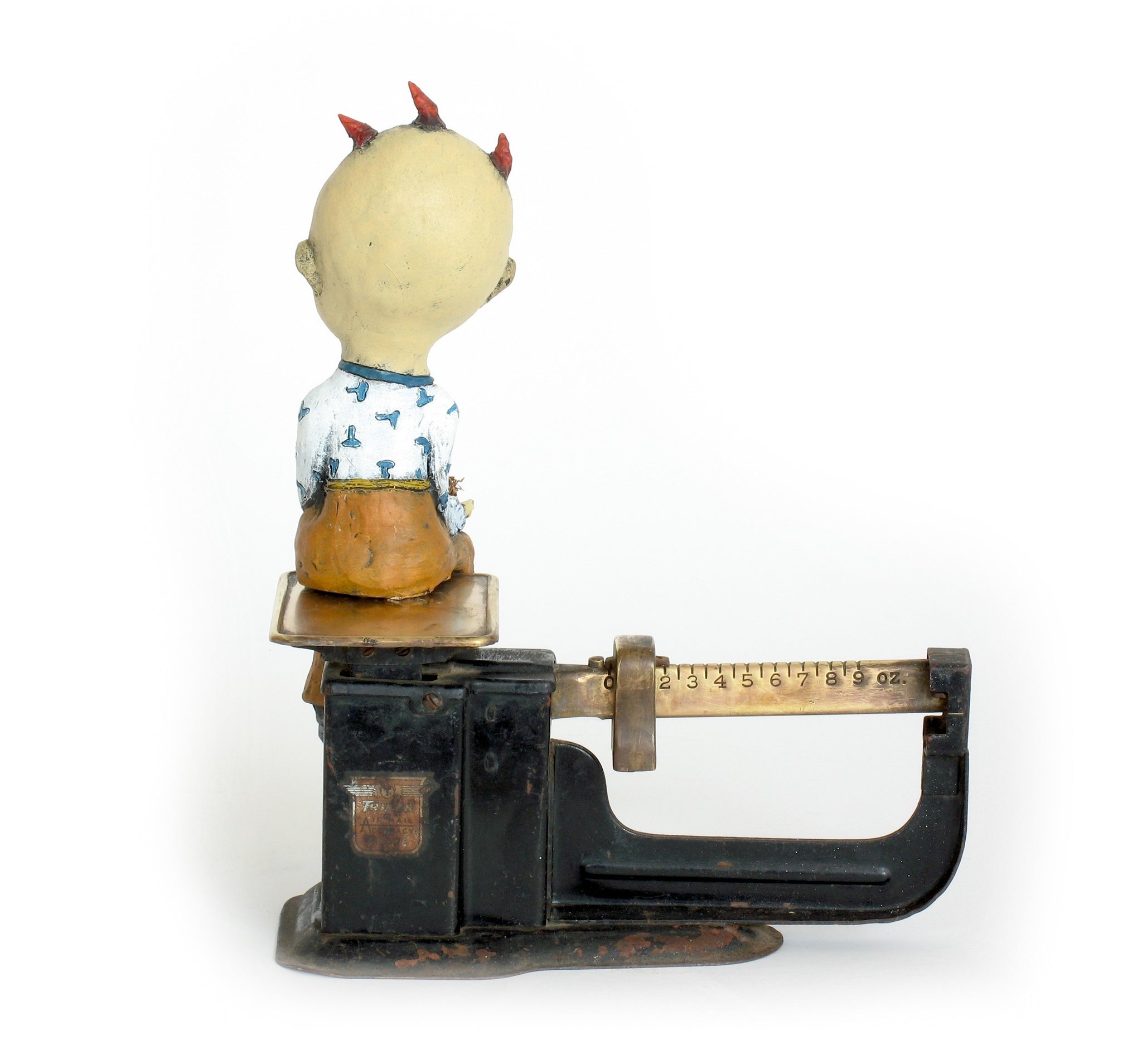 SOLD "The Weight of Responsibility" Original Ceramic Sculpture with Antique Scale by Jacquline Hurlbert