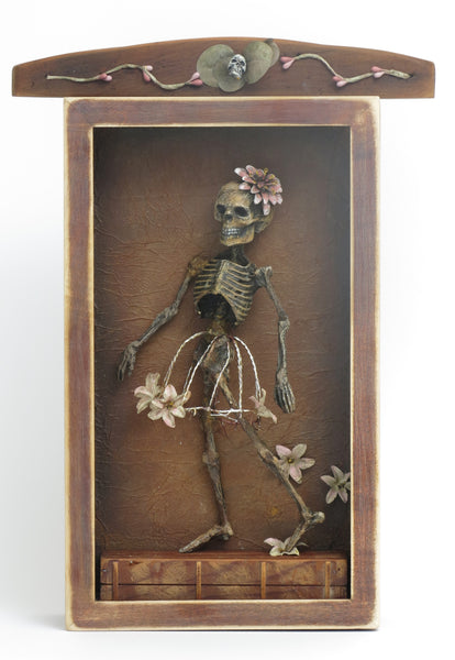 "Death Dons Her Tutu"